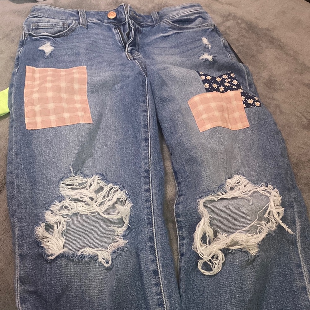 They have been worn a couple times. High rise, straight jeans.
